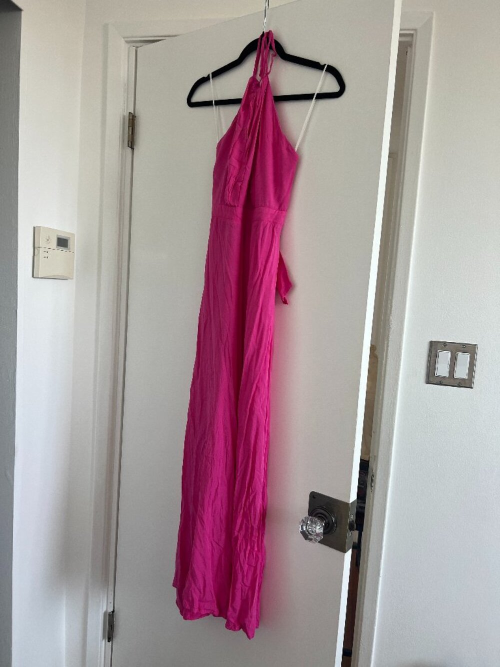 Pink halter jumpsuit around size M with cuotut in front area